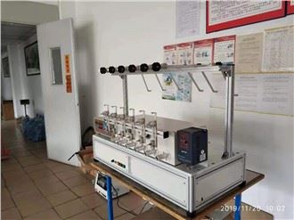 Bobinadora semiautomàtica de sis eixos